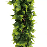 Artificial green leaf garland on a white background