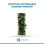 An artificial extendable hanging wreath made of green faux leaves and small berries, centered on a white background with the text 'ARTIFICIAL EXTENDABLE HANGING WREATH' above it and the Designer Plants logo below.