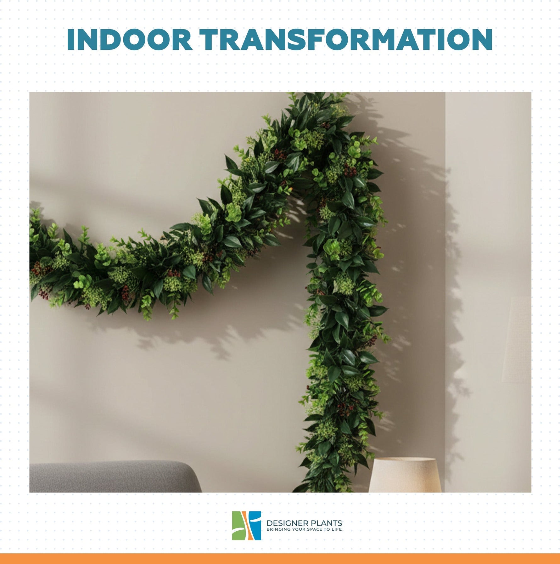 A green artificial leaf garland draped in an M-shape along a beige wall, with a lamp and sofa partially visible in the room setting. The text 'INDOOR TRANSFORMATION' appears at the top, and the 'DESIGNS-PLANTS' logo is shown at the bottom.