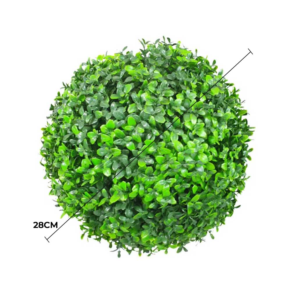 Artificial green ball with dimensions on a white background