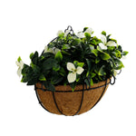 Artificial plant in a decorative basket on a white background