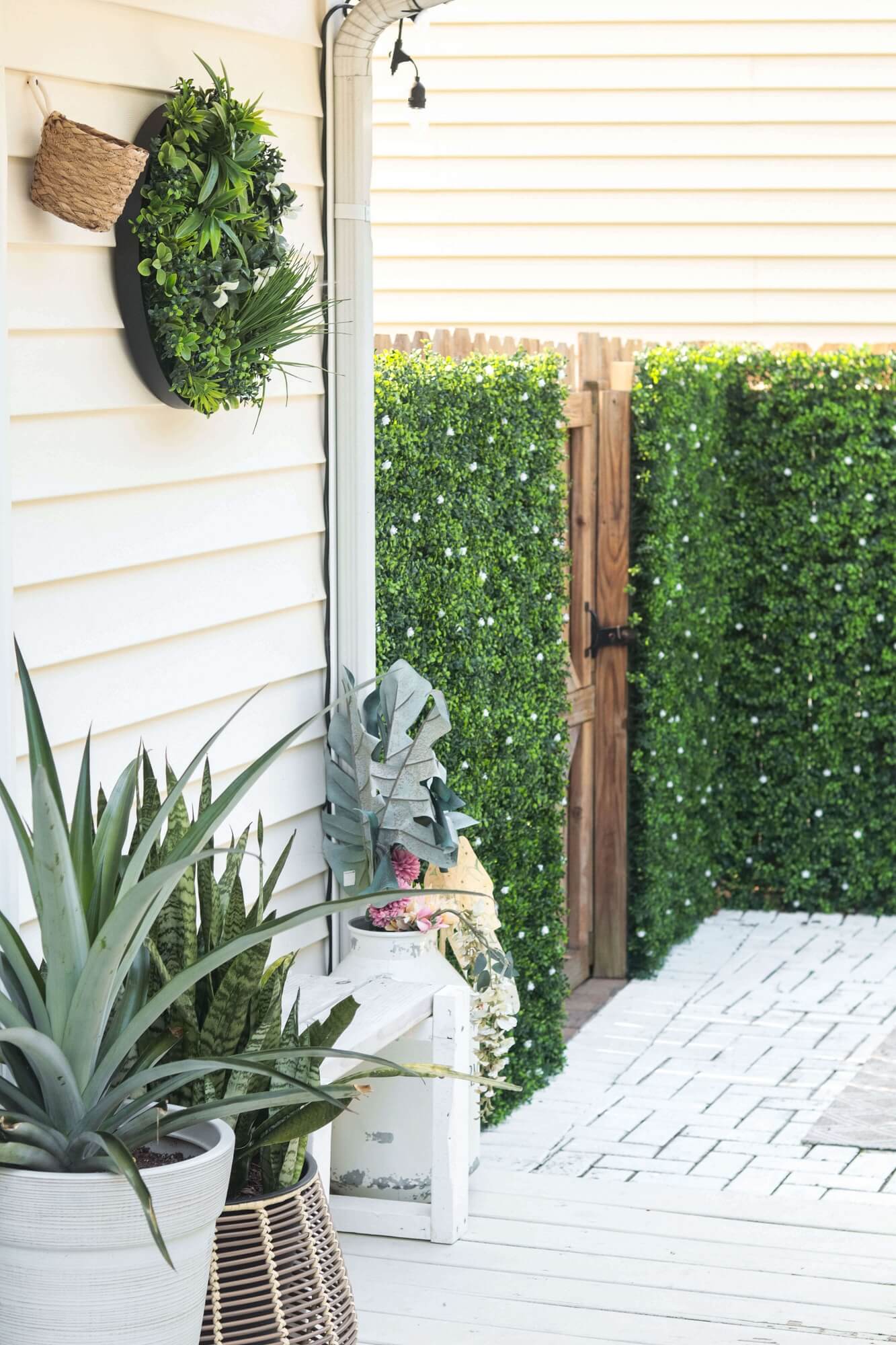 Flowering White Artificial Green Wall Disc UV Resistant 50cm (Black Frame) - Designer Vertical Gardens artificial garden wall plants artificial green wall australia